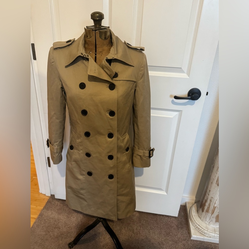 Burberry Classic Tan Double-Breasted Trench Coat with Check interior. Size 4.
